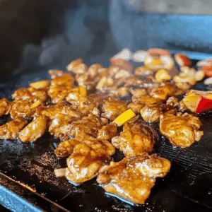 Looking for a simple yet flavorful dish? Try this Blackstone Bourbon Chicken made right on the griddle! With tender chicken coated in a sweet and tangy bourbon sauce, this recipe is perfect for weeknight dinners or weekend barbecues. Save this pin for an easy meal that your family will love!