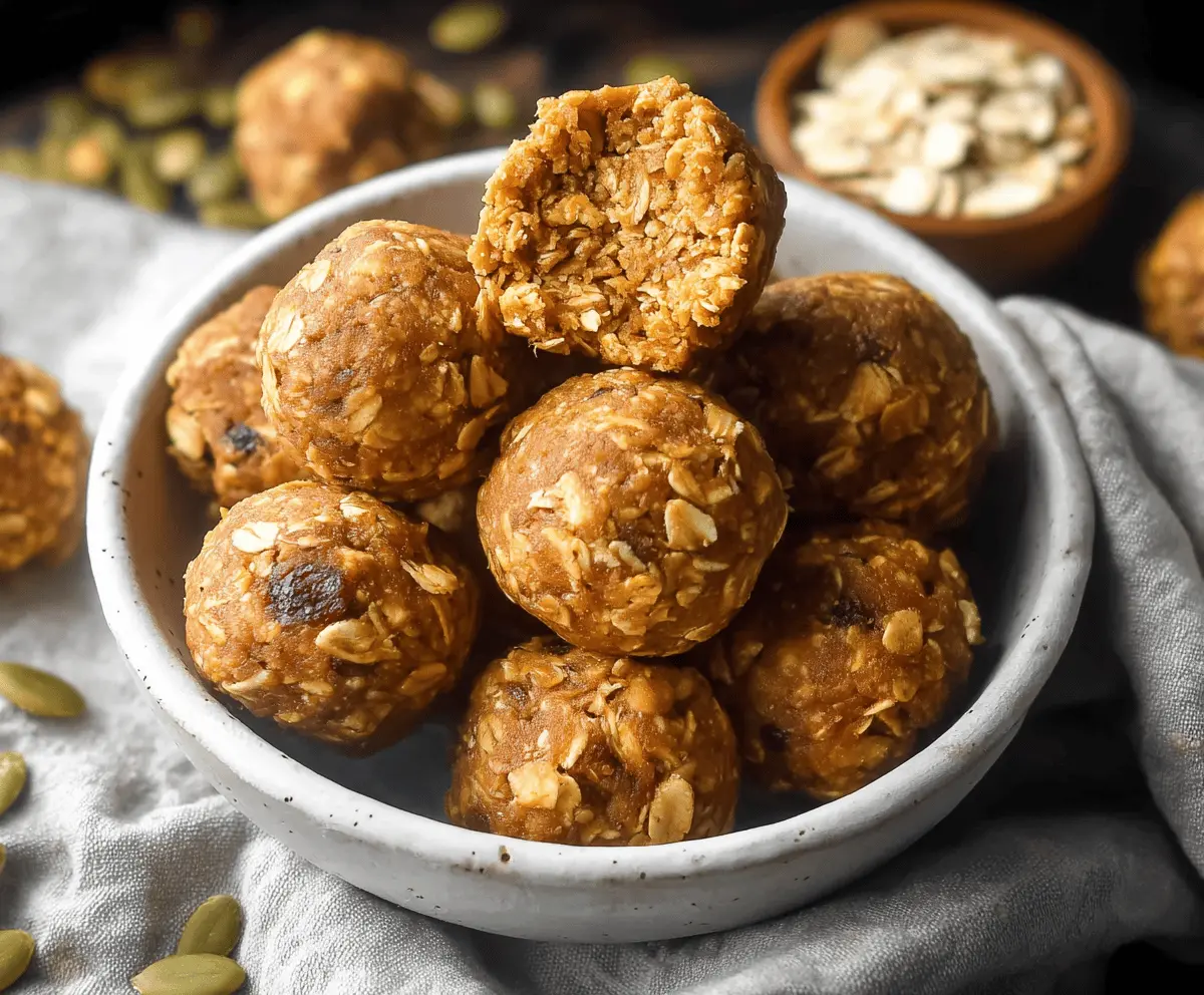 Delicious homemade oatmeal pumpkin protein balls on a white plate, healthy energy bites with oats, pumpkin, and protein powder ready to enjoy