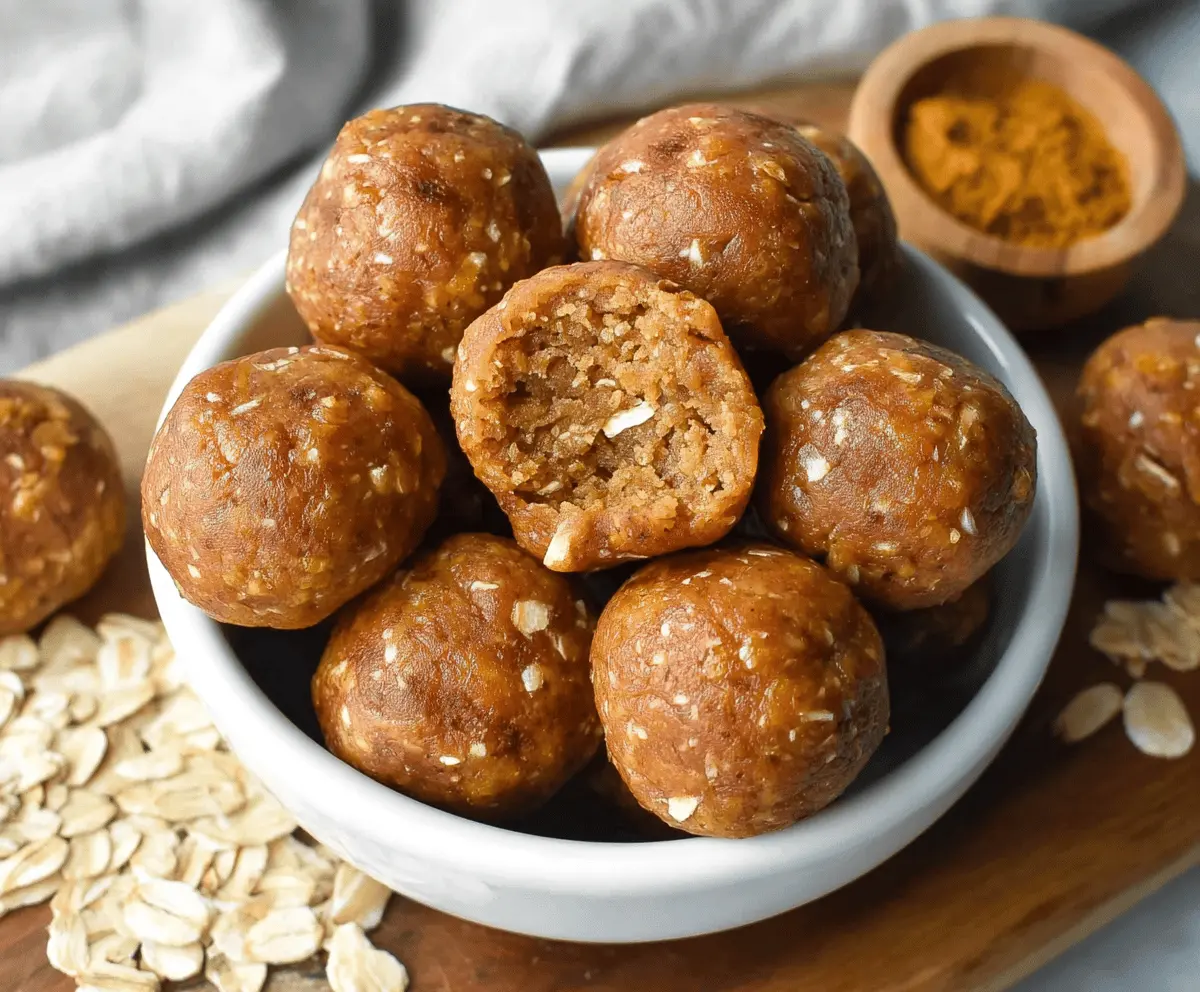 Delicious homemade Almond Butter Pumpkin Protein Balls on a white plate, featuring creamy almond butter, pumpkin puree, and protein powder for a healthy snack