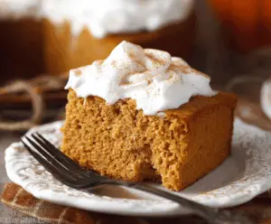 Delicious pumpkin 3-ingredient cake with moist texture and vibrant orange color, perfect for fall desserts