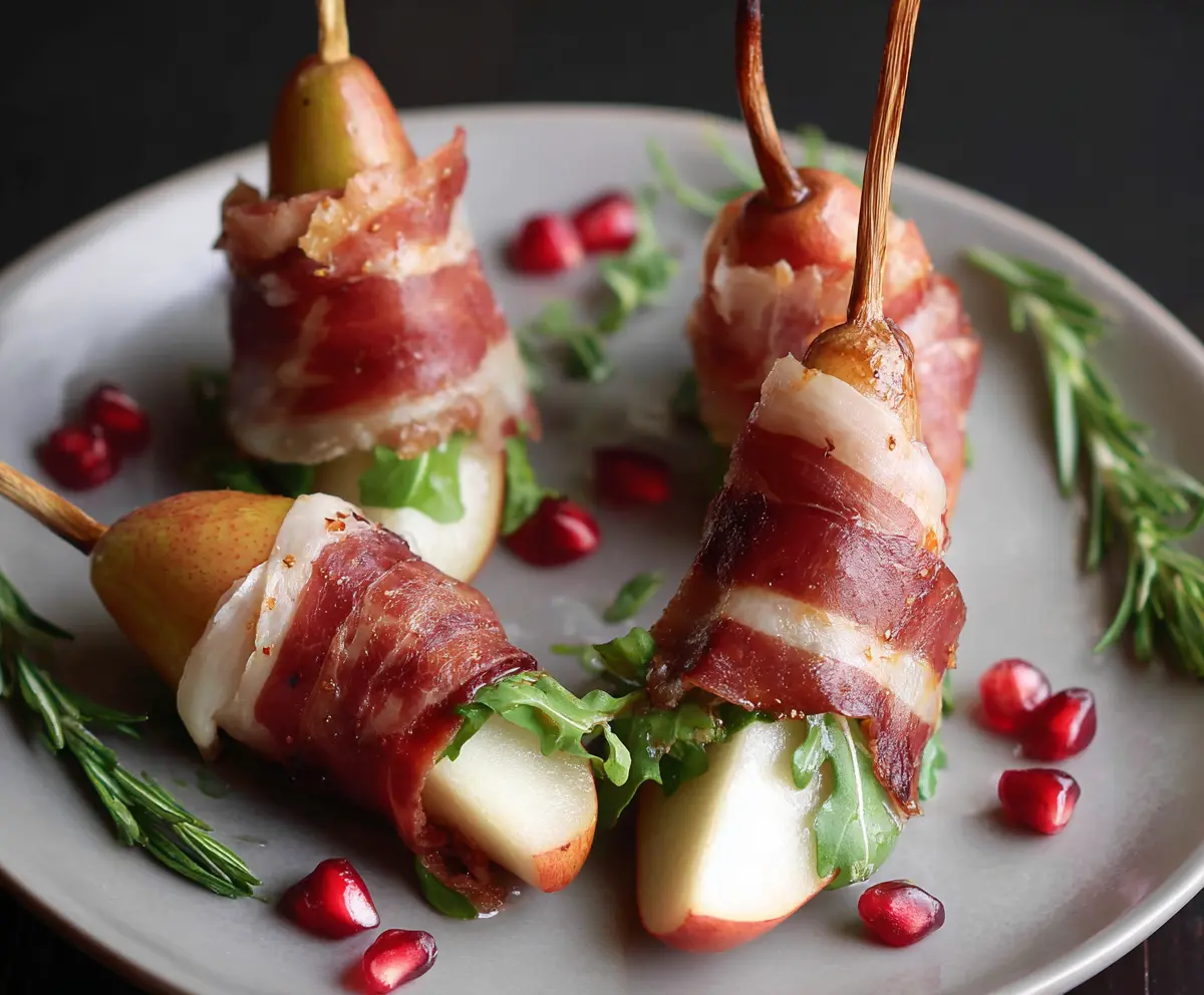 Prosciutto wrapped pears served as an elegant appetizer for parties.