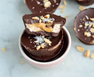 Delicious homemade Greek Yogurt Peanut Butter Cups with creamy peanut butter and smooth Greek yogurt coating