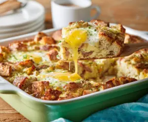 Delicious Easter Breakfast Casserole with eggs, cheese, and ham in a baking dish