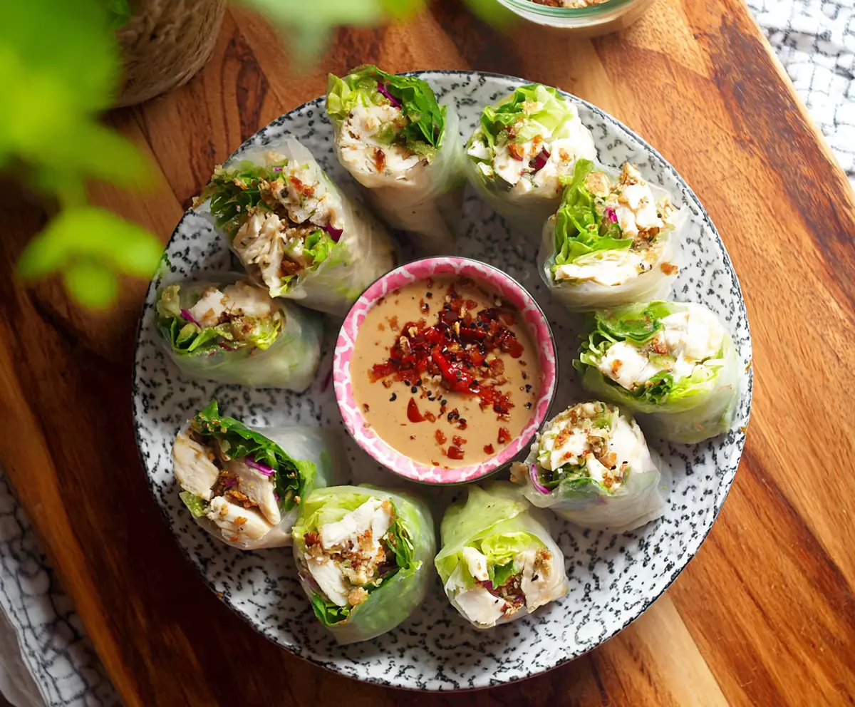 Delicious Caesar Chicken Rice Paper Rolls with fresh greens and creamy dressing